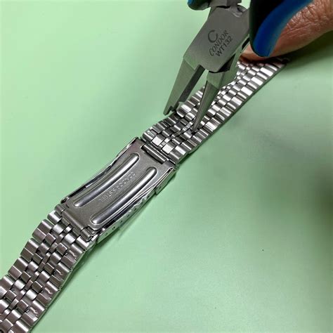 adjusting watch links.